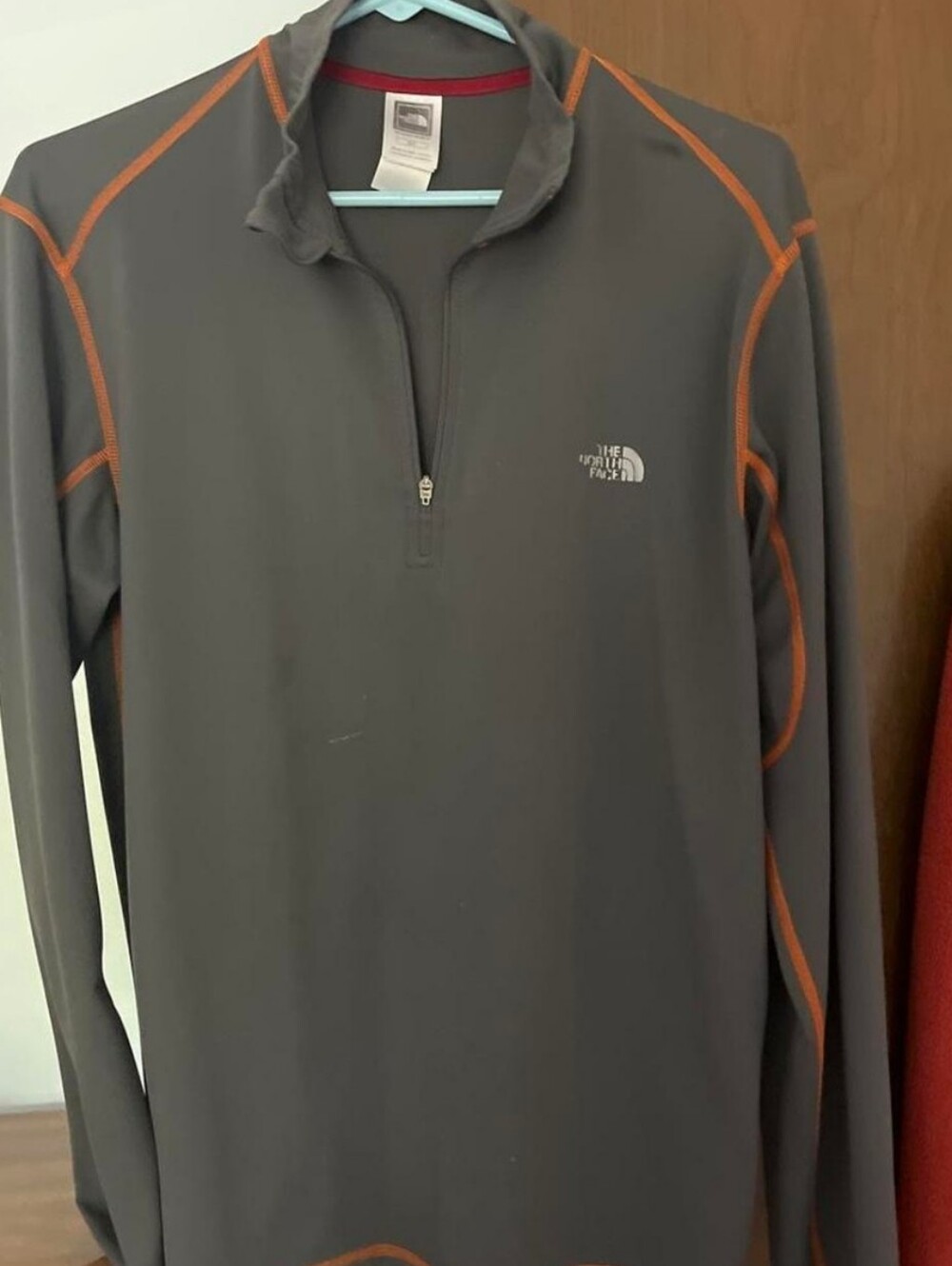 The North Face Men’s Charcoal Gray Quarter-Zip with Orange Stitching